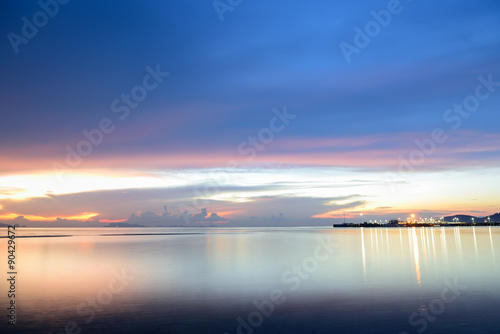 Panoramic dramatic sunset sky and tropical sea at dusk.Long expo