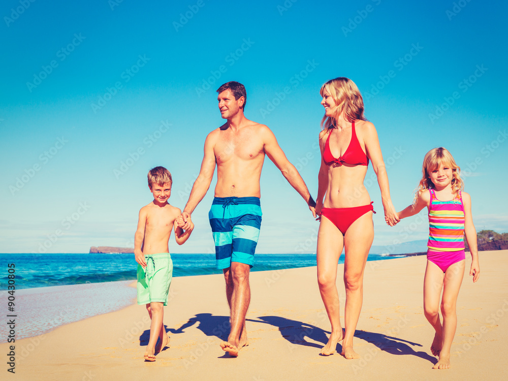 Happy Family Having Fun on the Beach Happy Family Having Fun on the Beach