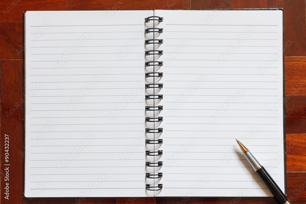 Notebook and pen. Notebook and pen.