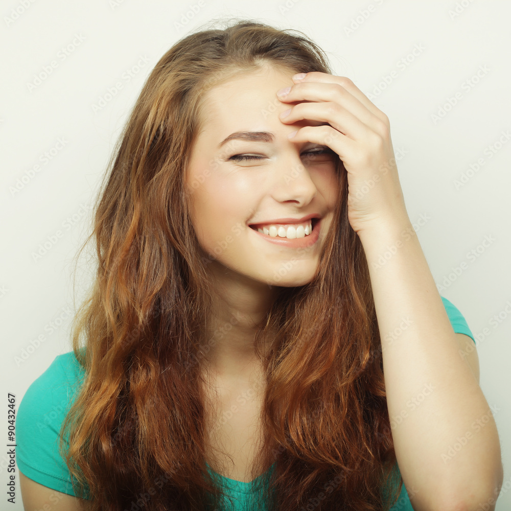 young surprised woman. Studio shot. 