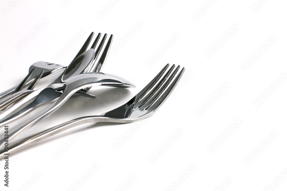 close up dinning silverware fork , spoon and knife with dish on close up dinning silverware fork , spoon and knife with dish on