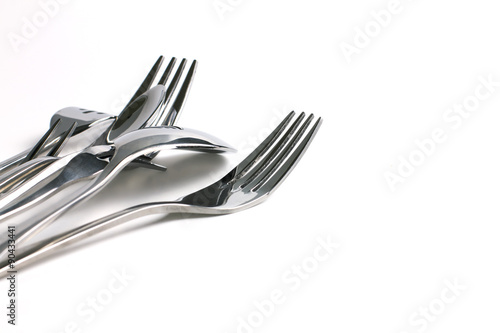 close up dinning silverware fork , spoon and knife with dish on