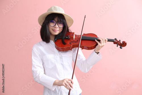 Asian teen with violin glasses hat smile
