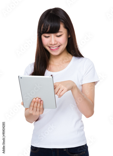 Young woman use of the digital tablet pc