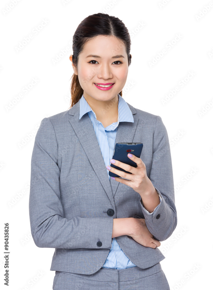 Businesswoman use of the cellphone Businesswoman use of the cellphone