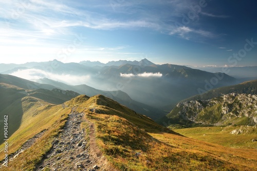Fototapeta Naklejka Na Ścianę i Meble -  Trail in the Carpathian Mountains at dawn, Poland