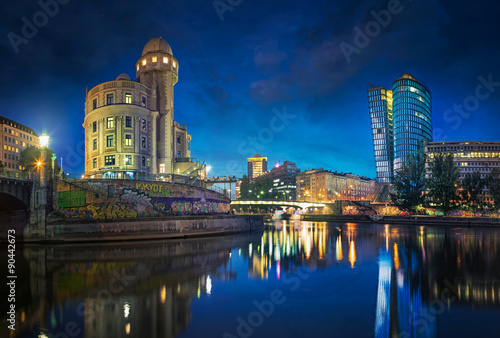 The Danube Canal in Vienna at Night with Urania and Uniqa Tower, Vienna, Austria photo