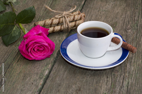 red rose, cup of coffee and linking of cookies