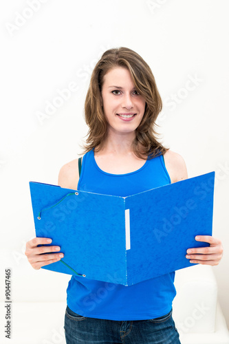 woman with a folder on a white background