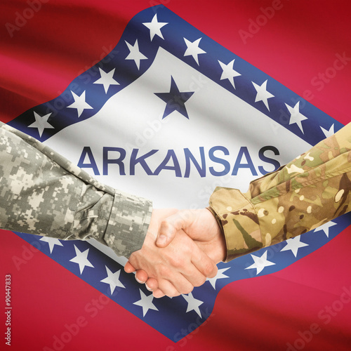 Military handshake and US state flag - Arkansas