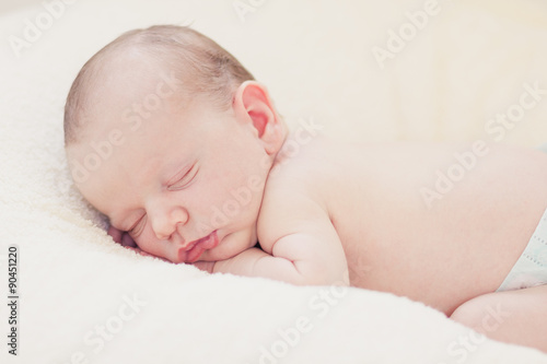 Sleeping newborn baby boy