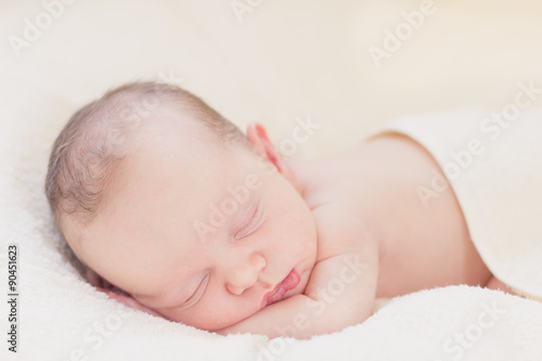 Sleeping newborn baby boy