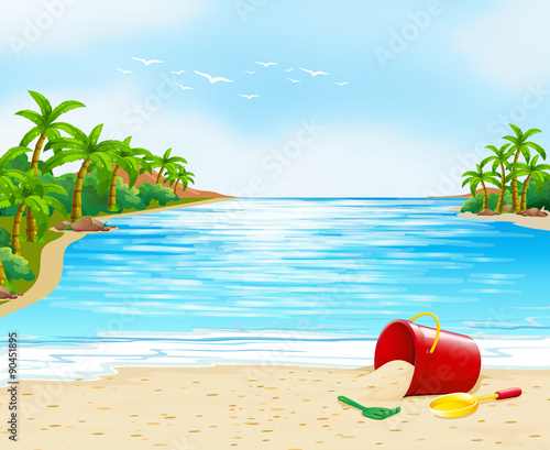 Ocean view with bucket on the sand