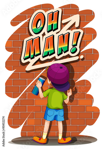 Boy spraying on the wall