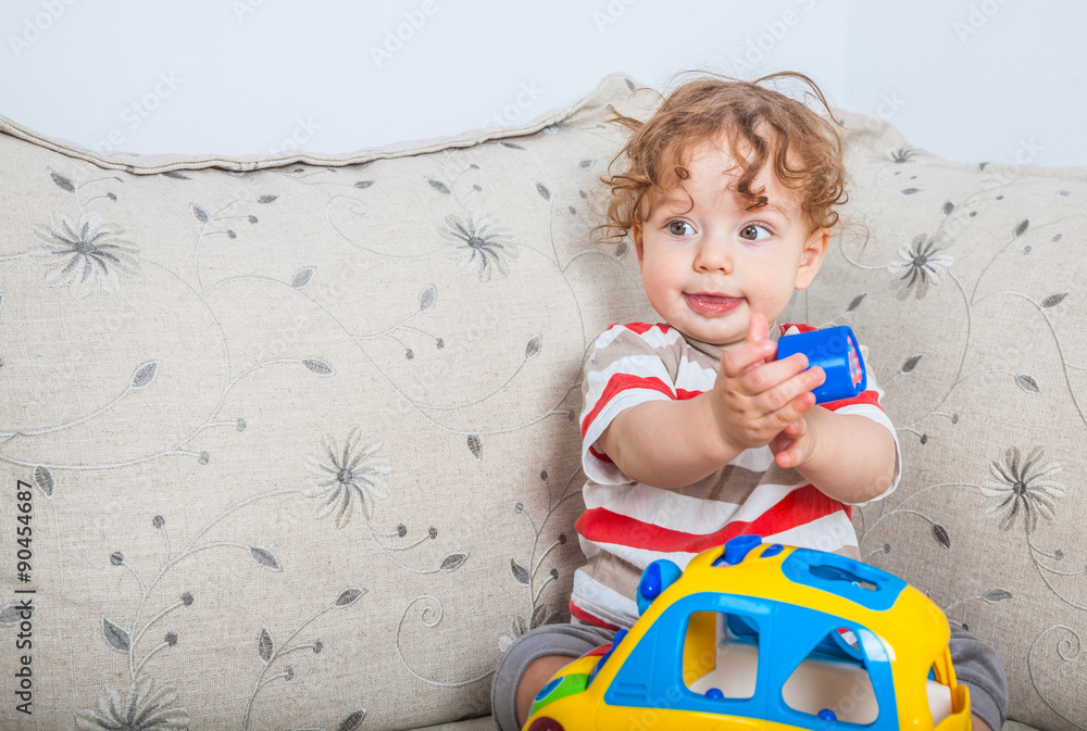 Fototapeta premium Baby boy playing