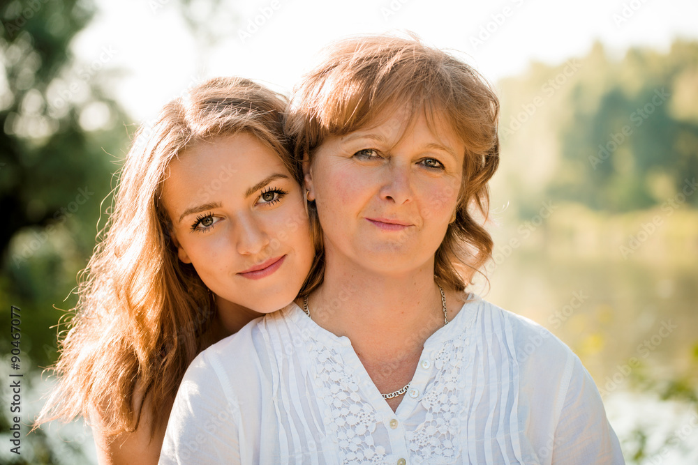 Obraz premium Mother and daughter outdoor portrait