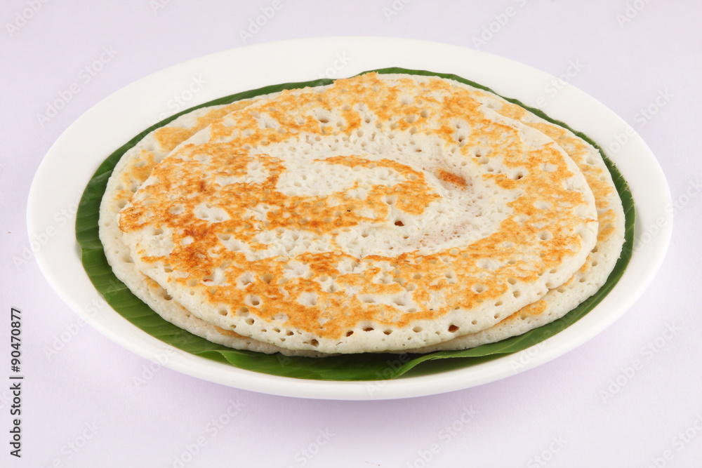 South Indian breakfast Dosa served on banana leaf. South Indian breakfast Dosa served on banana leaf.
