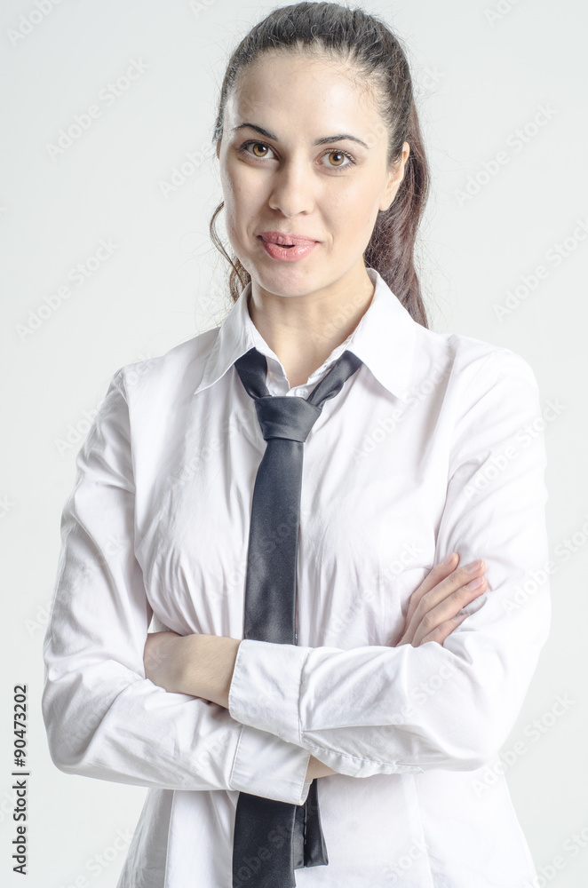 Young strict brunette in a white shirt with a tie
Young strict brunette in a white shirt with a tie