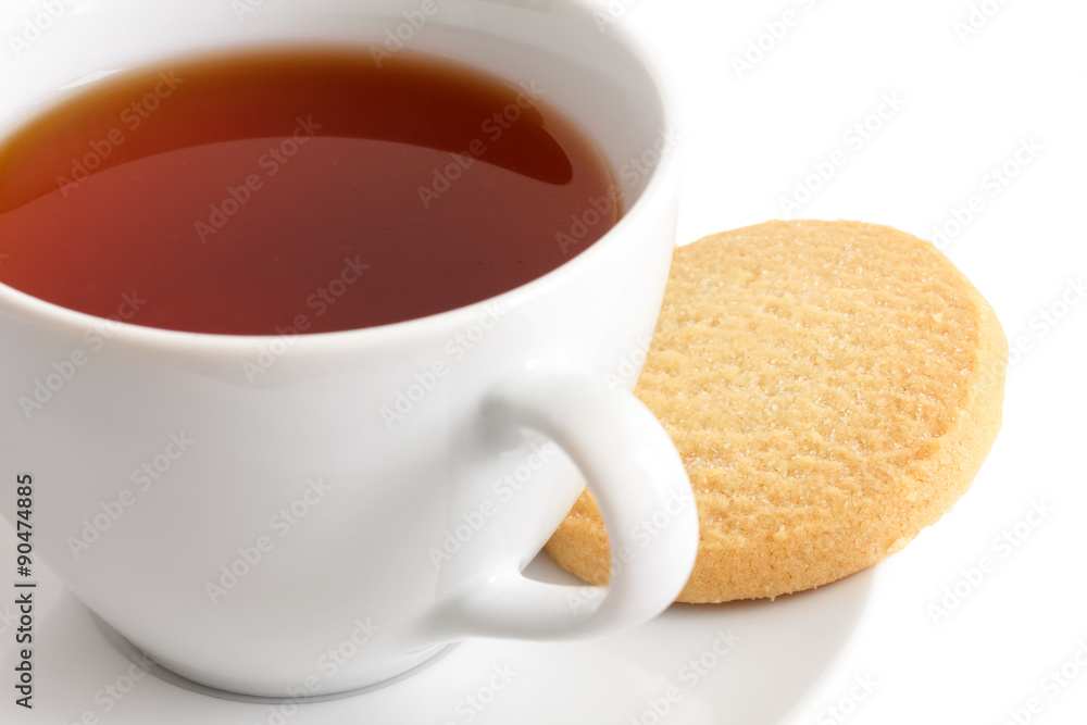 Detail of a white ceramic cup of rooibos tea with shortbread bis Detail of a white ceramic cup of rooibos tea with shortbread bis