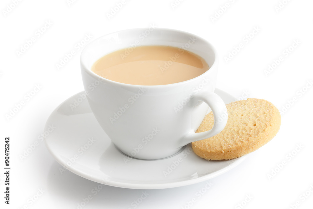 White ceramic cup and saucer with tea and shortbread biscuit. Is White ceramic cup and saucer with tea and shortbread biscuit. Is