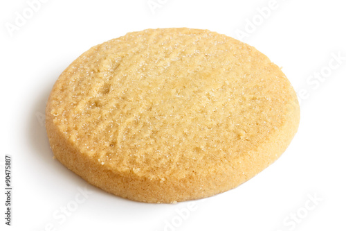 Single round shortbread biscuit isolated on white.
