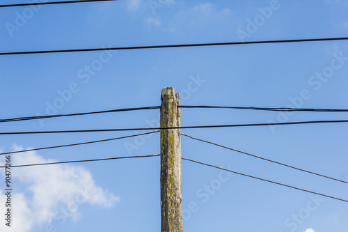 electric pole power lines and wires with blue sky