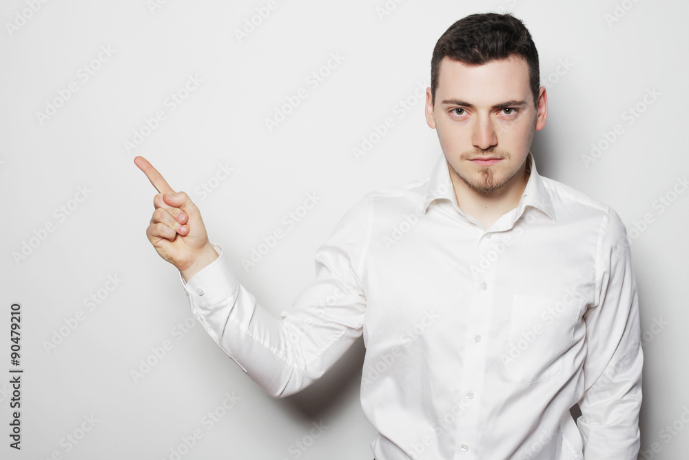 business man points with fingers in the right side business man points with fingers in the right side