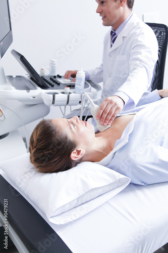 Doctor doing a doppler sonography