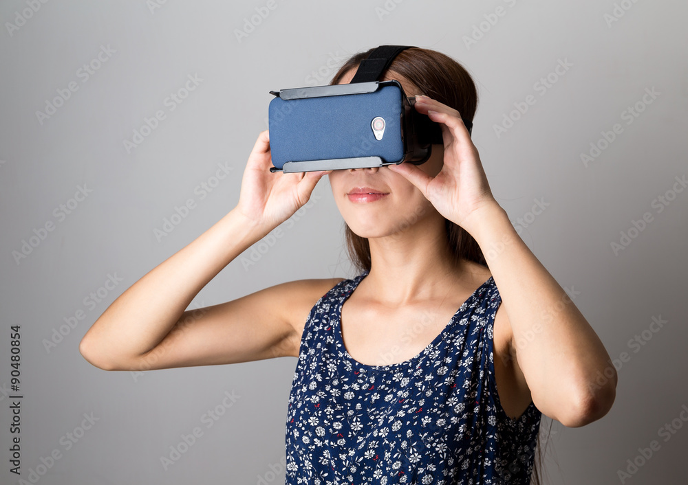 Woman using the VR device Woman using the VR device