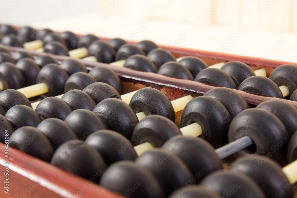 Wooden abacus on table wood texture background. Wooden abacus on table wood texture background.