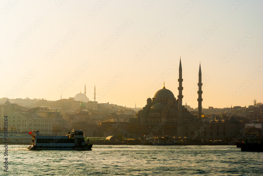Skyline of Istanbul with silhouette of mosques as seen from the Golden Horn