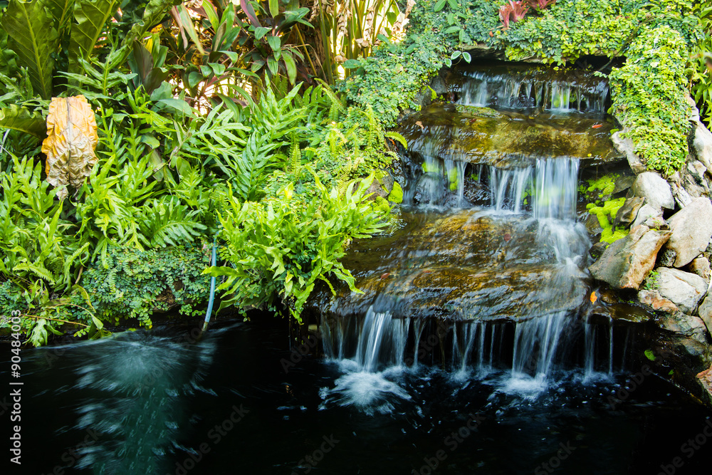 Fototapeta premium Waterfall in garden design.