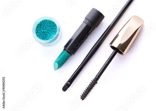 Fototapeta Naklejka Na Ścianę i Meble -  Top view of loose eye shadow, lipstick, makeup brush, and mascar