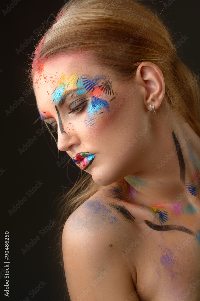 Naklejka premium Beautiful woman with art make-up 