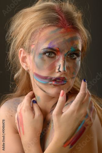 Beautiful woman with art make-up 