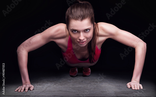 young woman doing Push up