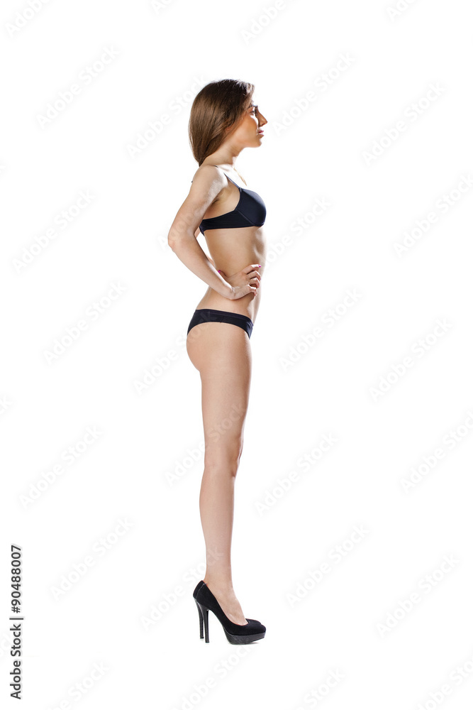 Full length portrait of a beautiful young model in black bikini Full length portrait of a beautiful young model in black bikini
