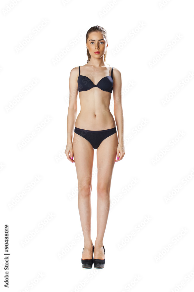 Full length portrait of a beautiful young model in black bikini Full length portrait of a beautiful young model in black bikini