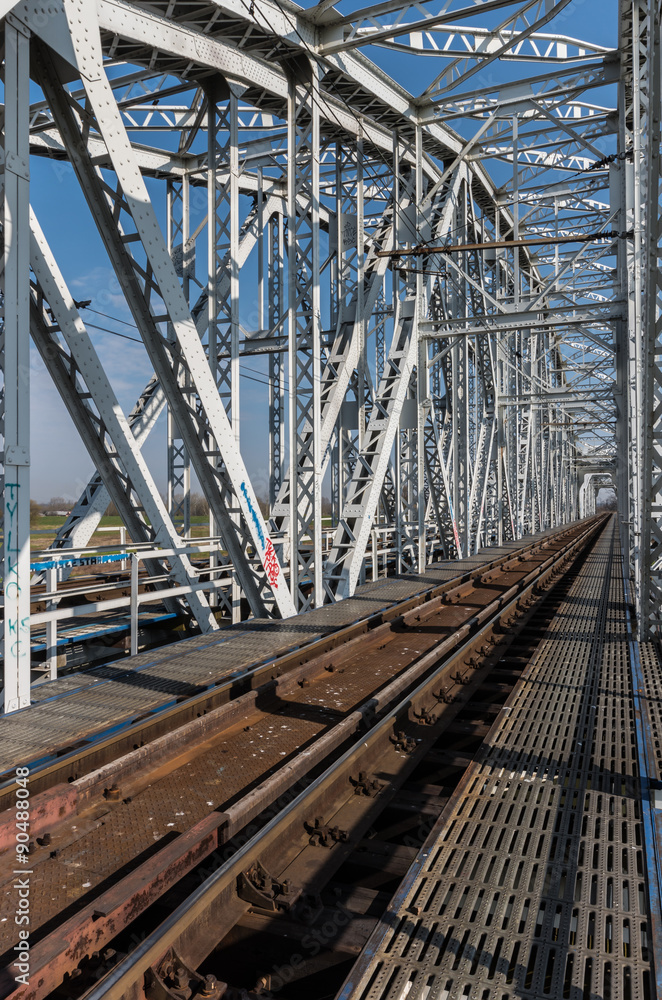 Railway steel truss bridge in Brzegi, Poland, near Krakow, over Vistula river