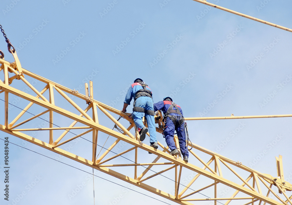 Men at work on the crane 