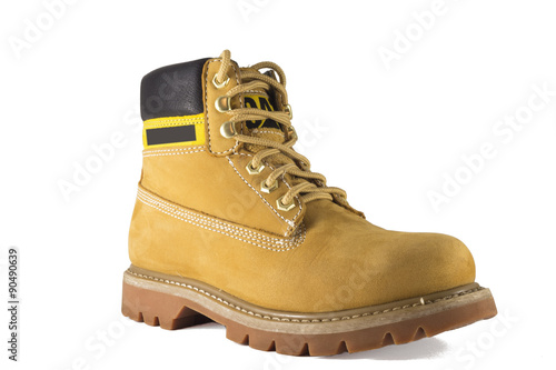 Large yellow shoes with rough soles and laces