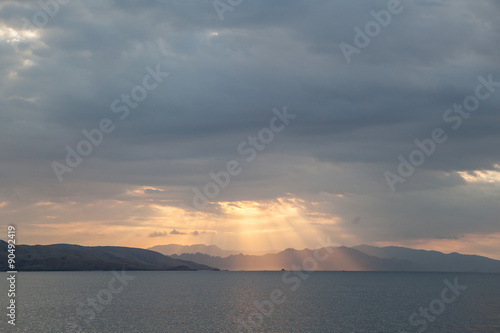 Light Pouring Through Clouds in Komodo National Park