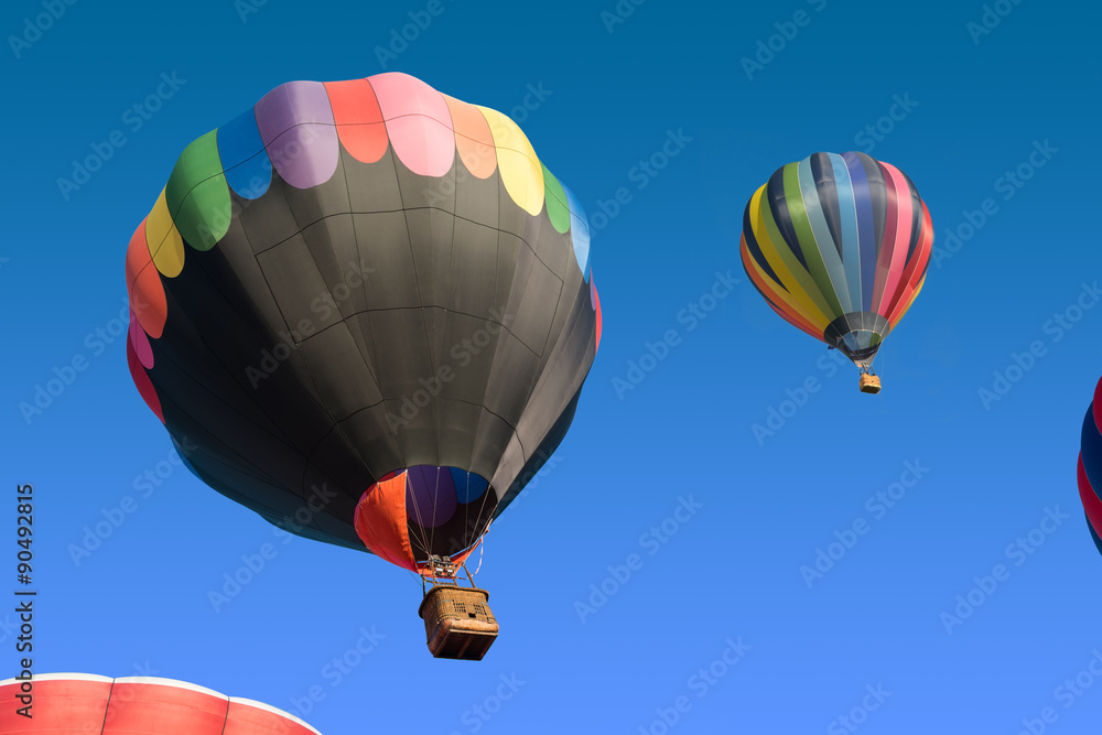 Fototapeta premium colored hot air balloons taking off