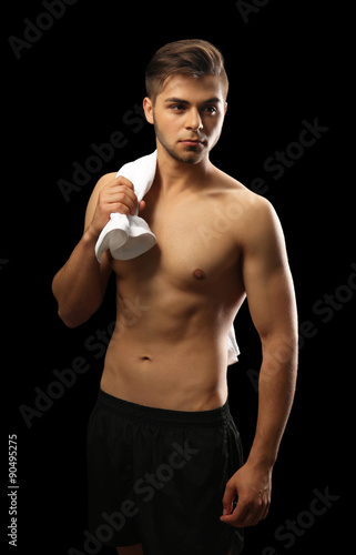 Muscle young man holding to...