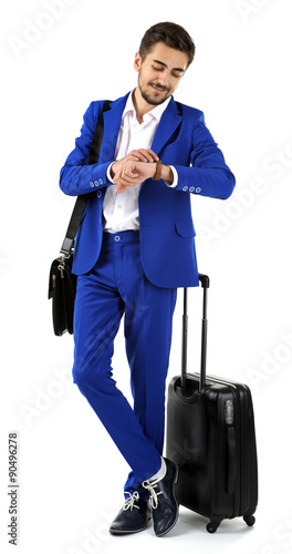 Business man with suitcase isolated on white