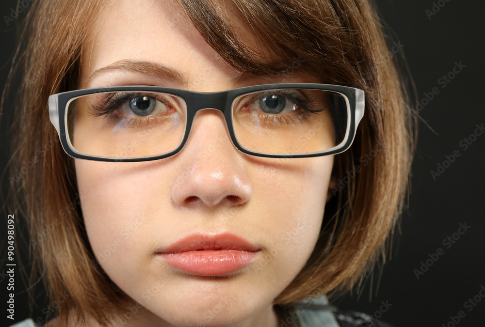 Attractive young woman with glasses close up Attractive young woman with glasses close up