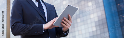 Obraz na płótnie Businessperson using digital tablet