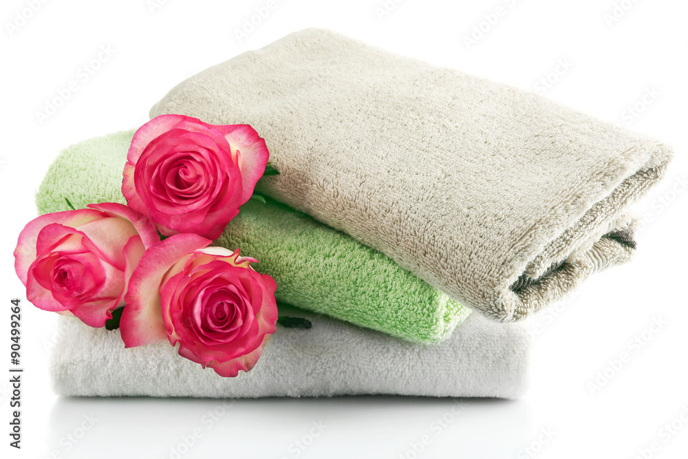 Stack of colorful towels isolated on white Stack of colorful towels isolated on white