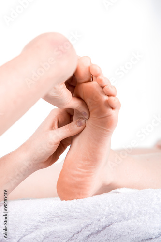 doctor reflexology to woman patient