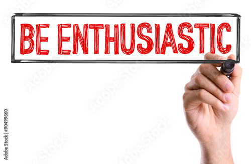 Hand with marker writing the word Be Enthusiastic